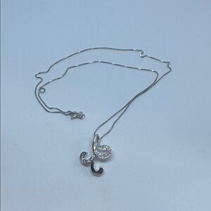 18” Rhodium Finish .925 Box Chain with CZ Pendant.